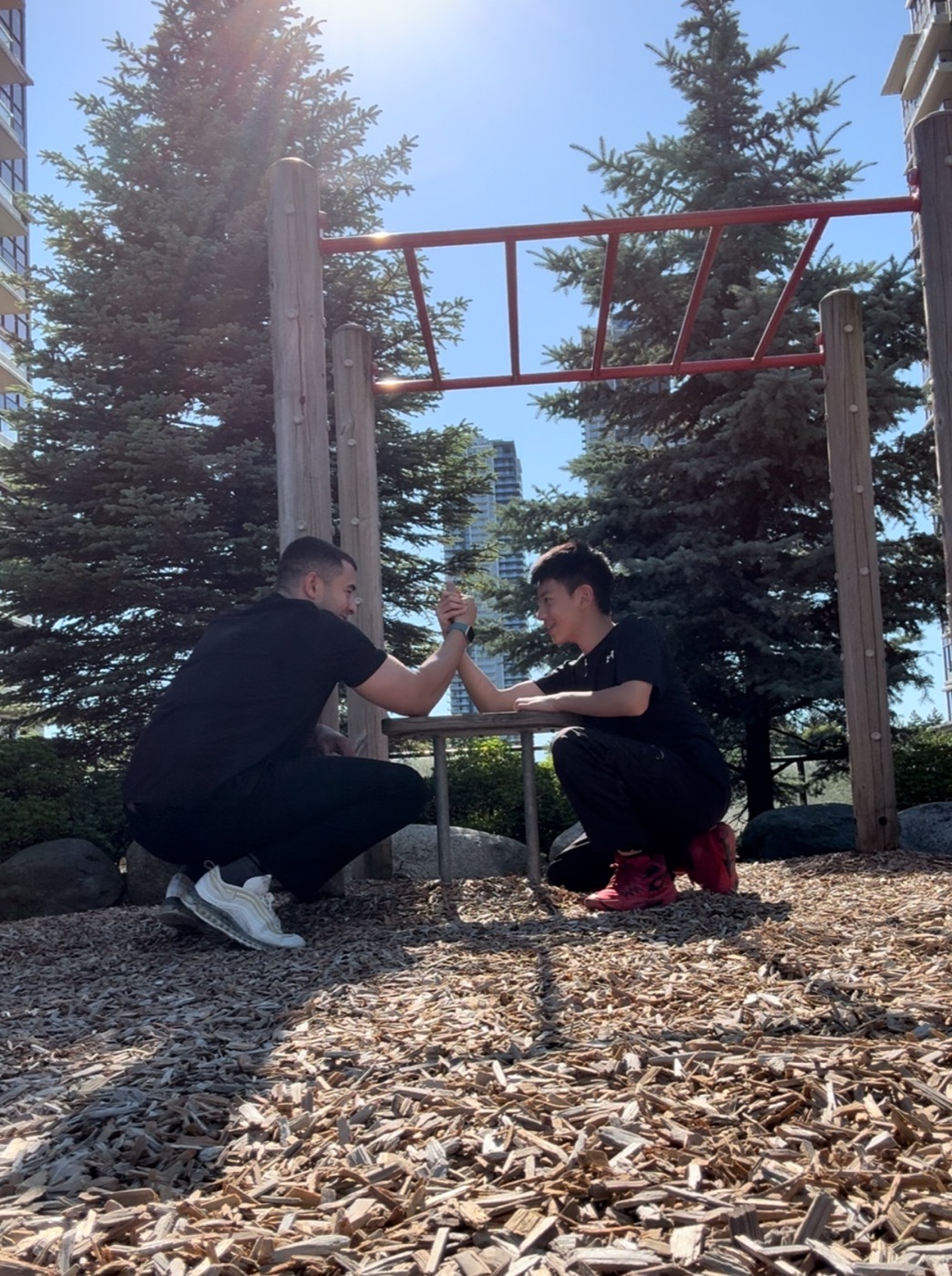 An assistant and a young client bonding at the park
